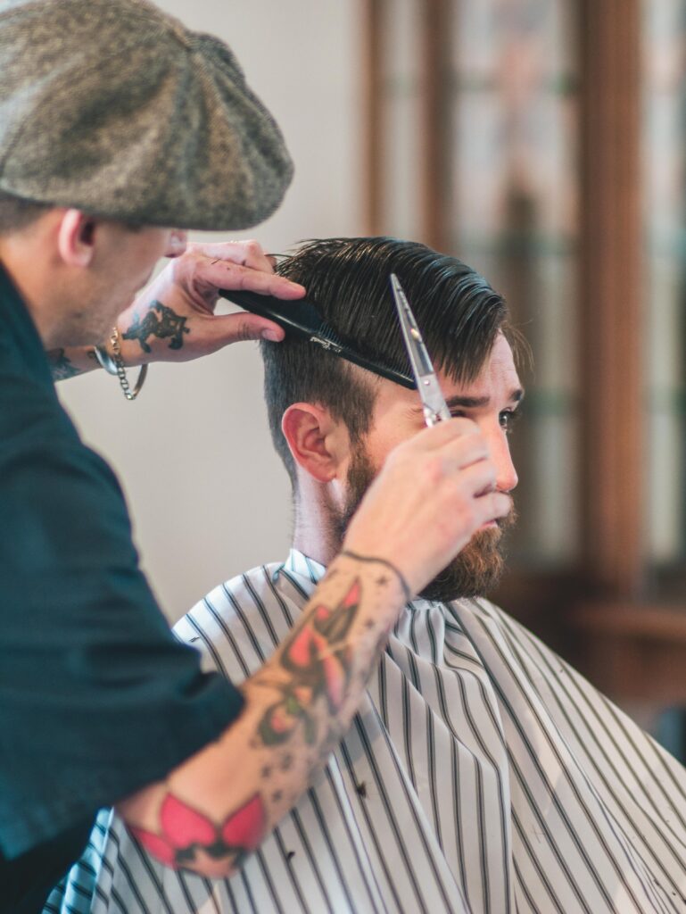 Premium Barber Services in Flagstaff Arizona, A Man Is Getting a Hair Cut At The Urban Shave